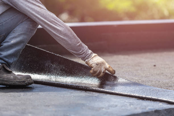 Professional Basement Waterproofing technician working in Weehawken, NJ